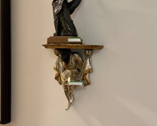 Pair Venetian Blackamoor wall bracket with Maitland Smith Spinx statue. 