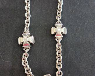 Barry Kietelstein Cord sterling necklace. The red is a reflection.