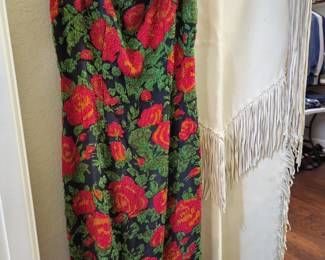 Dress with roses is an allover beaded design. The surface is completely covered with beading! The buckskin dress is in like-new condition. Both are amazing!!