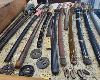 Japanese swords waiting to be tagged and identified.