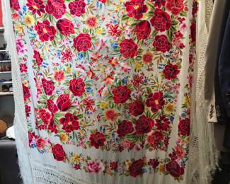 Large shawl is embroidered on both sides. Exceptional quality. Excellent condition.