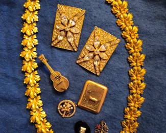 Keep sake trinkets, gold tone necklace.