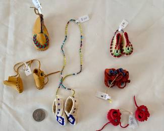 Native American beaded ornaments. See pics for pricing. Choice. Buy it now. Red bottom right beaded on chain pair doe skin moccasins sold