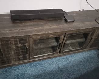 Item 36 Small Entertainment Cabinet 64.5"L X16" D X 21.5 H      $70  (very heavy)