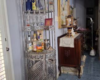 Item 12 Vintage Style Bar Hammered Silver paint on Iron Has Wine and liquor Storage as well as goblet storage.  Aprox Dimensions: 78" HX 22"W X21" D $300