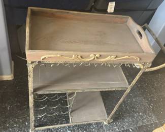 Item 11 Wine/ Beverage/ Dessert Cart on Casters. Blue tinted wood and gold hammered Iron has Wine rack and goblet holders Top Serving Tray is removable,  $150  or best offer