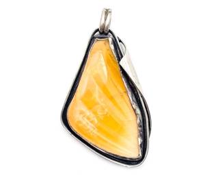 Sterling Silver And Butterscotch Amber Pendant