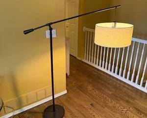 Modern Black Metal Adjustable Floor Lamp with Beige Fabric Drum Shade