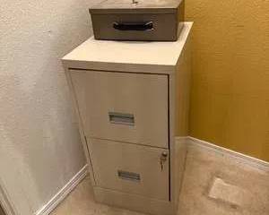 Two Drawer Beige Metal Filing Cabinet with Lockable Brown Metal Cash Box