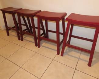 4 saddle stools.
