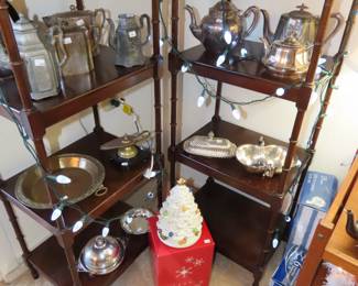 Two matching knick knack shelves.