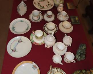 Bone china and porcelain tea cups, plates  and teapots.