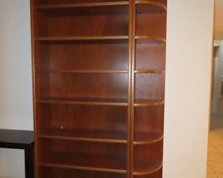 2 MCM teak bookcases and two rounded end shelves.