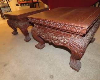 Two matching Asian low end tables.