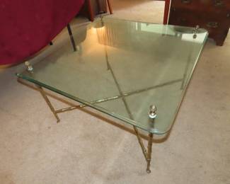 Glass and brass coffee table.