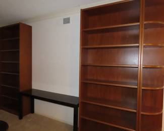 2 MCM teak bookcases and two rounded end shelves.