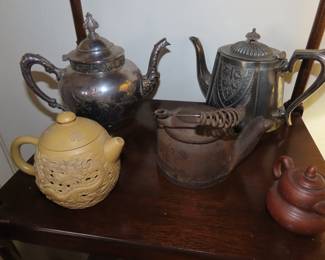 Japanese and Chinese teapots and kettles.