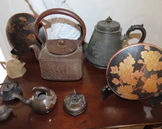 Japanese and Chinese teapots and kettles.