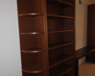 2 MCM teak bookcases and two rounded end shelves.
