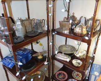 Two matching knick knack shelves.