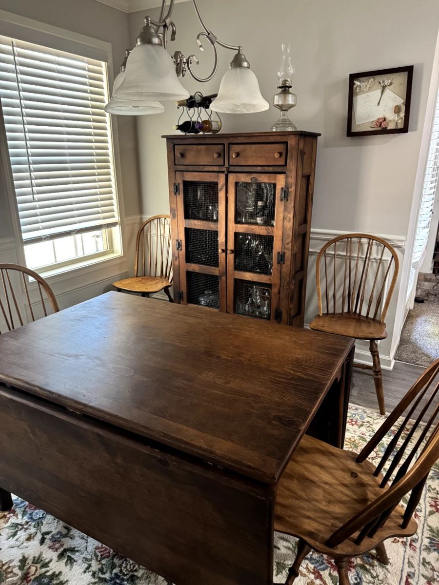 Made especially for this owner.  You have to see this table! It has two extensions and two benches to make seating for 12 or smaller.  So versatile for your family's needs. 