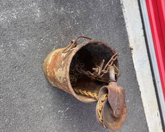 Rusty bucket and chain