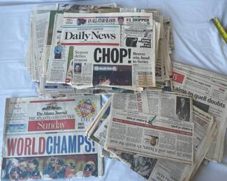 Briefcase full of Atlanta Braves newspapers, 1996 olympics