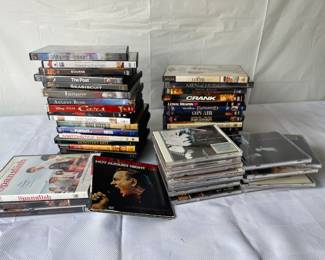 Assortment of dvds and cds