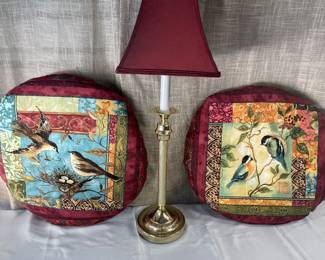 Lamp with decorative pillows