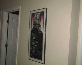 framed art work in hallway