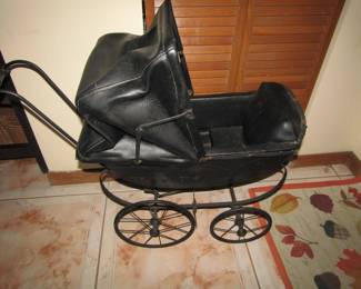 vintage leather baby buggy
