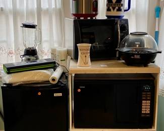 Food storage vacuum sealer with bags, college refrigerator, microwave, blender, air popper, rice cooker, rotisserie oven, rolling kitchen shelves