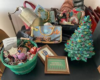 Beaded, leather and furry purses and handbags in additional to Christmas ornaments, and one 2-ft tall lighted, ceramic Christmas tree.