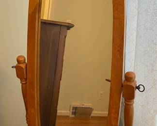 Chevel mirror in wood frame.