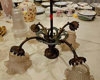 Lots of lighting fixtures all are Vintage or antiques