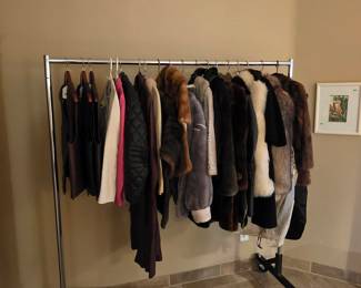Luxurious fur coats, leather jackets, and leather vests