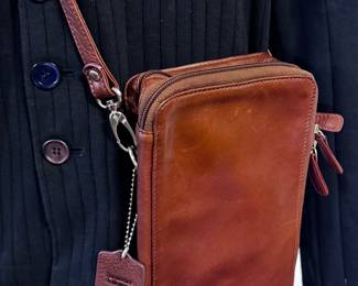 Appears as new Men’s “Murse”. (We hate the name too… but we all love the functionality and style!)