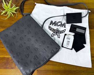 With original tags and dust bag MCM large leather wristlet purse