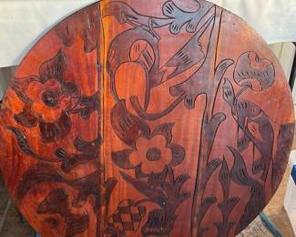 Hand, carved double sided table top