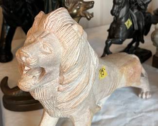 Hand carved stone lion