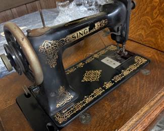 Antique Singer Sewing machine with cabinet