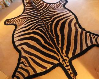 Zebra hide rug