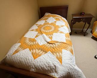 Twin sleigh beds (2 available); quilts