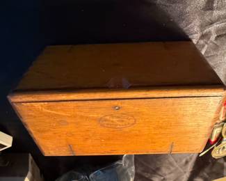 Antique Singer sewing oak puzzle box & attachments