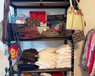 New cashmere sweaters, purses, t shirts and knit pants