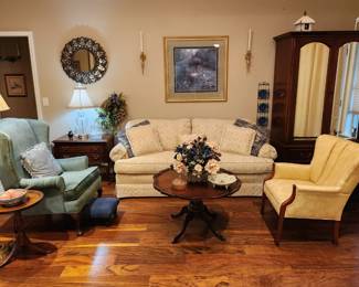 Very nice cream upholstered sofa with 2 upholstered side chairs and quality side tables.
