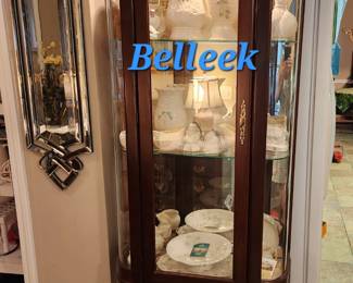 Very nice curio cabinet filled with Belleek & pink glassware.