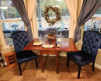 Beautiful drop-leaf table with upholstered blue chairs. 3 nice R.S. Prussia china pieces.