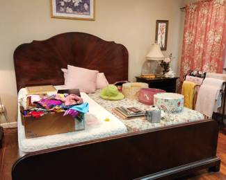 Beautiful wooden king size bed with head & foot board. Adjustable Brookstone mattress.