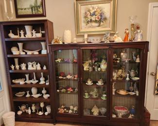 Very nice bookcase & early 1900 4-door oak bookcase with wavy glass. Both are filled with Lenox, Capodimonte, 2 carved (what we believe to be) jade pieces.